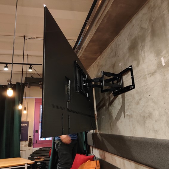 S9 Double Arm Full Motion TV Bracket Swivel Wall Mount job done photo